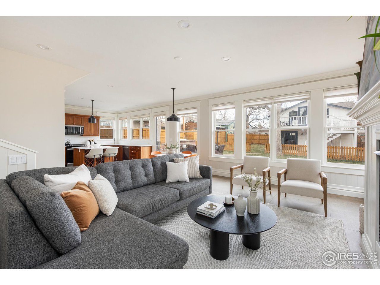 721 Concord Avenue Boulder, CO 80304 - Photo 7 of 40 a living room with furniture and a large window