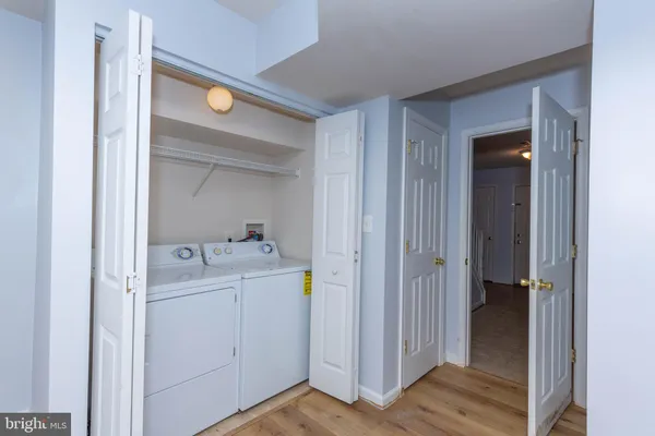 a view of a bathroom with mirror