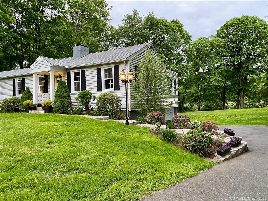 314 North Salem Road Ridgefield, CT 06877 - Photo 1 of 1 front view of a house with a yard