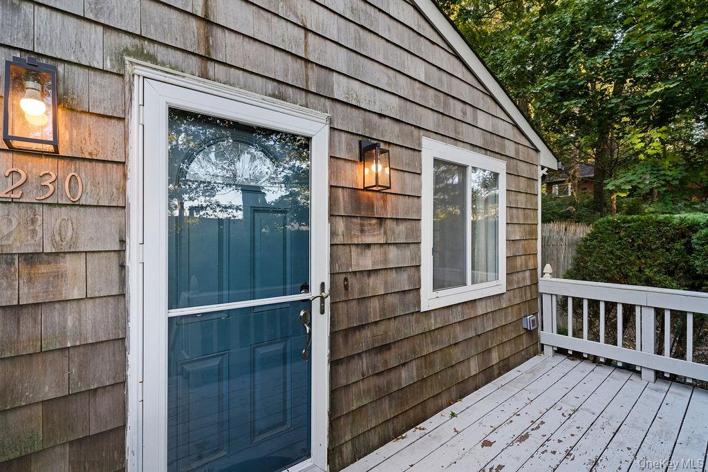 230 Lakeside Trail Ridge, NY 11961 - Photo 19 of 33 a view of a house with a large window
