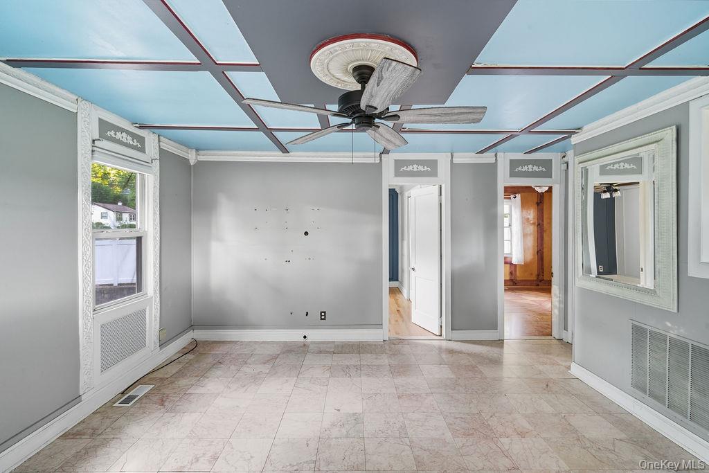230 Lakeside Trail Ridge, NY 11961 - Photo 9 of 33 a view of a livingroom with a chandelier