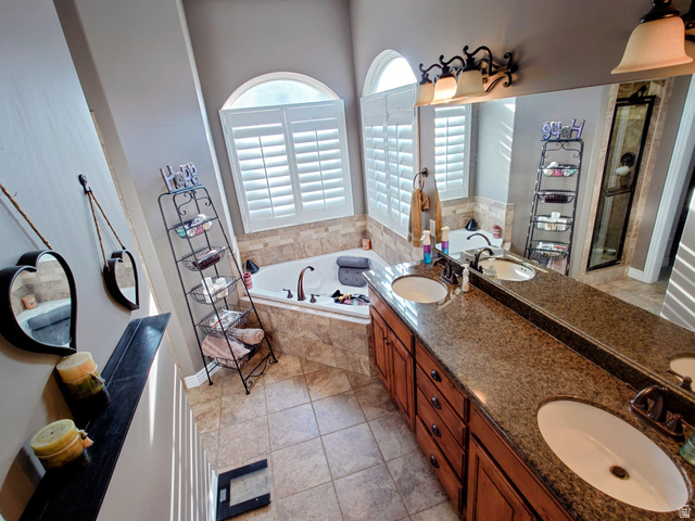 552 Sunset Crest Way Draper, UT 84020 - Photo 22 of 68 Bathroom featuring double vanity, a bath, and light tile patterned flooring