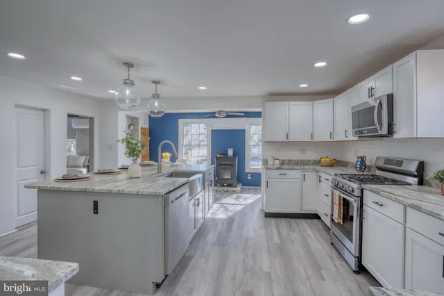 a workspace with furniture window and wooden floor