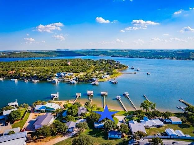 4713 Fox Hollow Road Graham, TX 76450 - Photo 1 of 39 WONDERFUL, 3/2 WESTSIDE PK WATERFRONT LAKEHOUSE WITH DEEP WATER DOUBLE LEVEL DOCK.