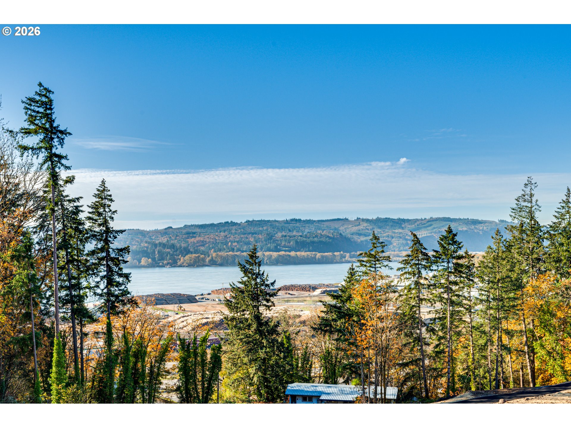 Spencer Creek Road Kalama, WA 98625 - Photo 8 of 21 a view of a lake and mountain in the back