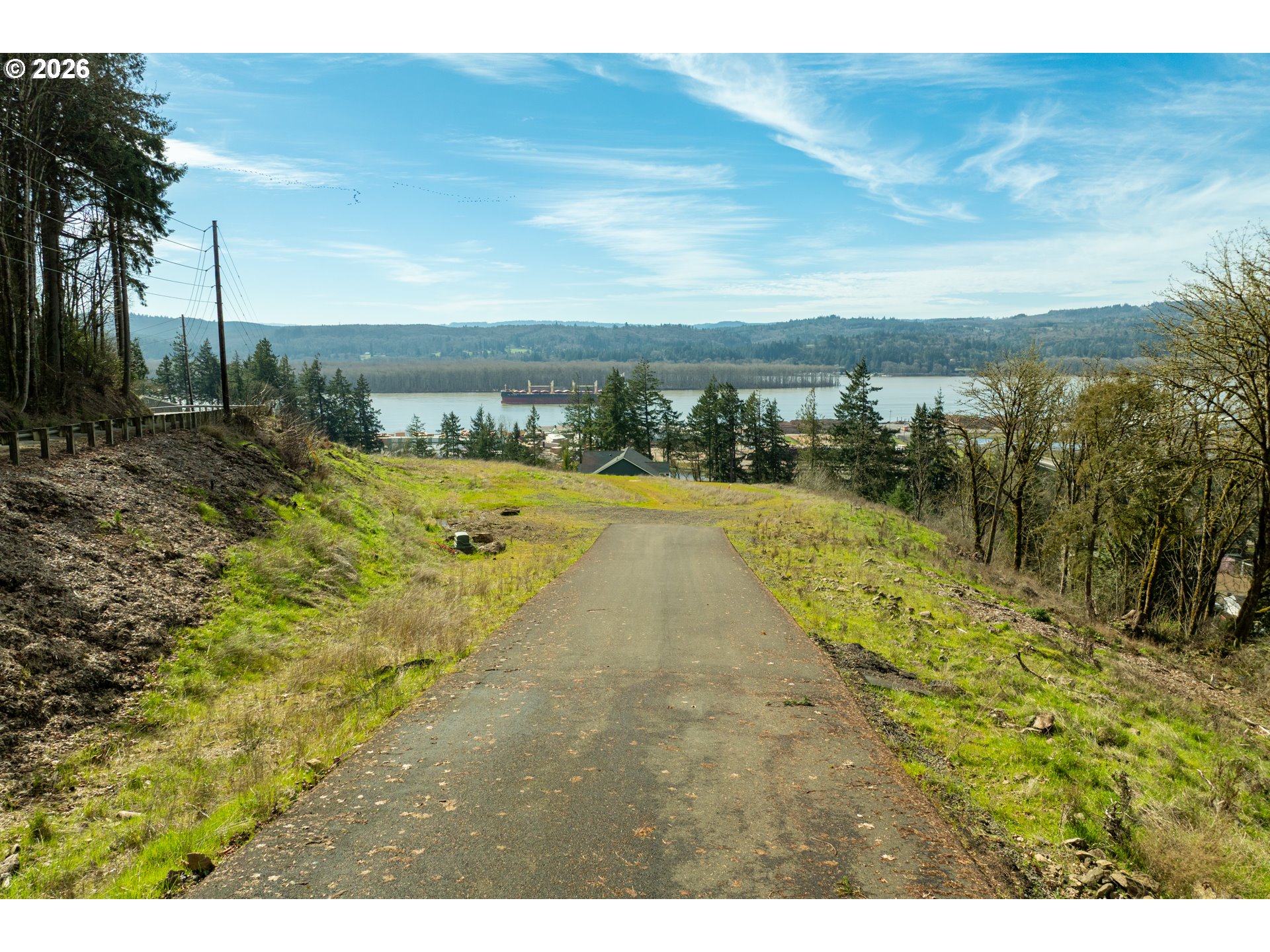 Spencer Creek Road Kalama, WA 98625 - Photo 9 of 21 a view of a swimming pool with an outdoor space and seating area