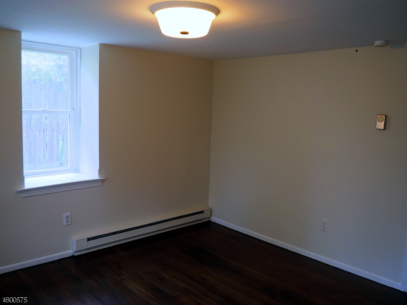 41 Canal Street Landing, NJ 07850 - Photo 13 of 20 an empty room with wooden floor and windows