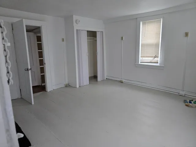 an empty room with windows