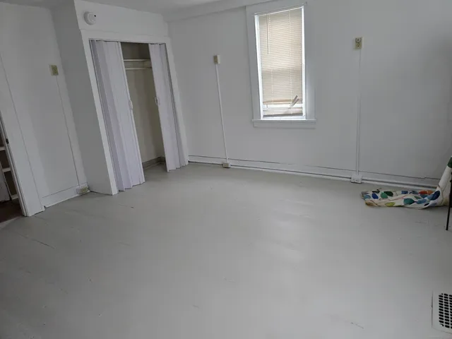 an empty room with a window