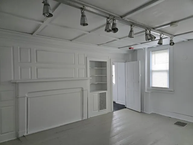 a view of a room with an empty space
