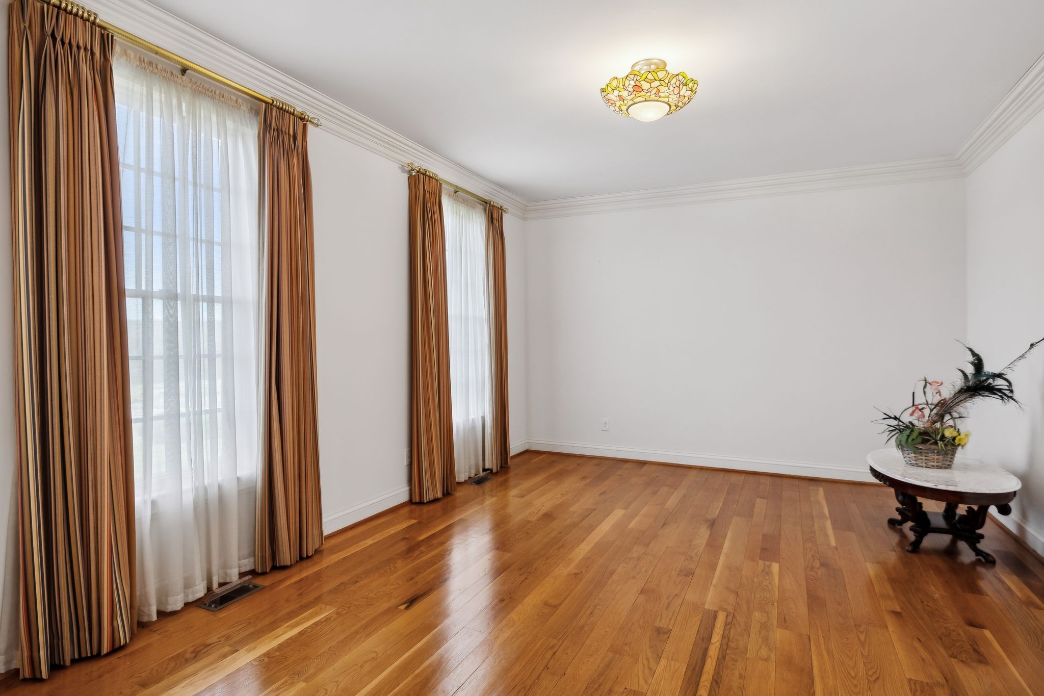 5090 Main Street Spring Hill, TN 37174 - Photo 14 of 91 a view of a room with wooden floor and bench