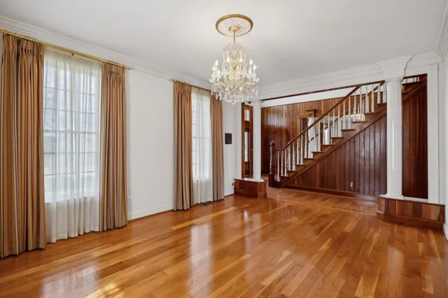 a view of entryway with wooden floor