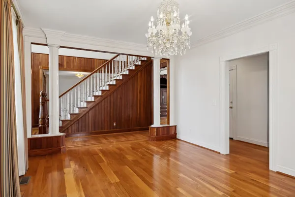 a view of entryway with wooden floor