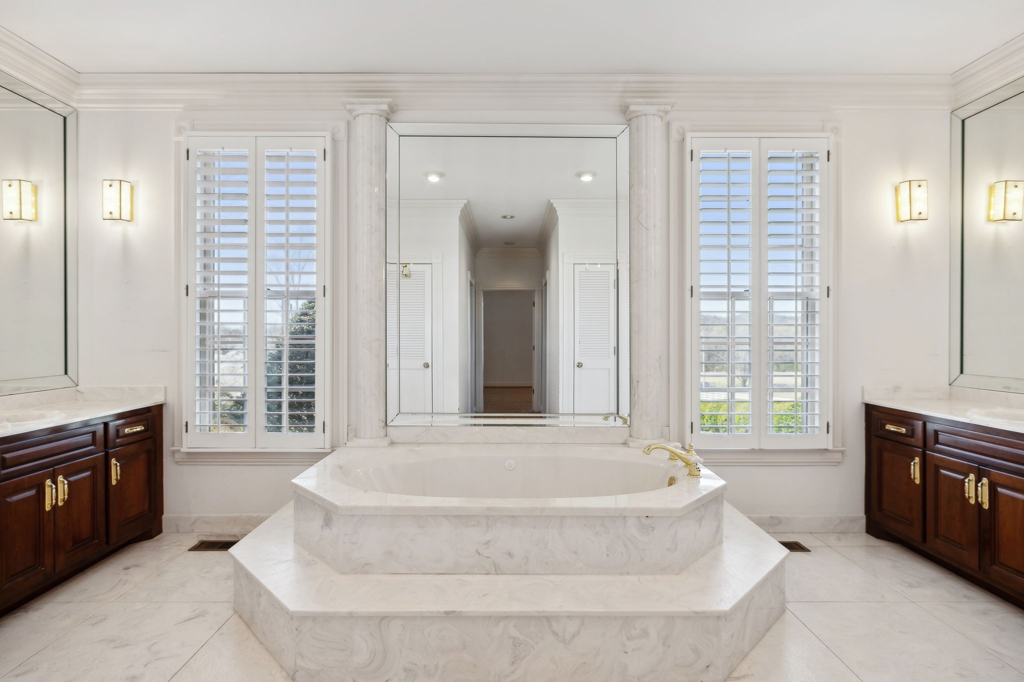 5090 Main Street Spring Hill, TN 37174 - Photo 33 of 91 a spacious bathroom with a tub sink and mirror