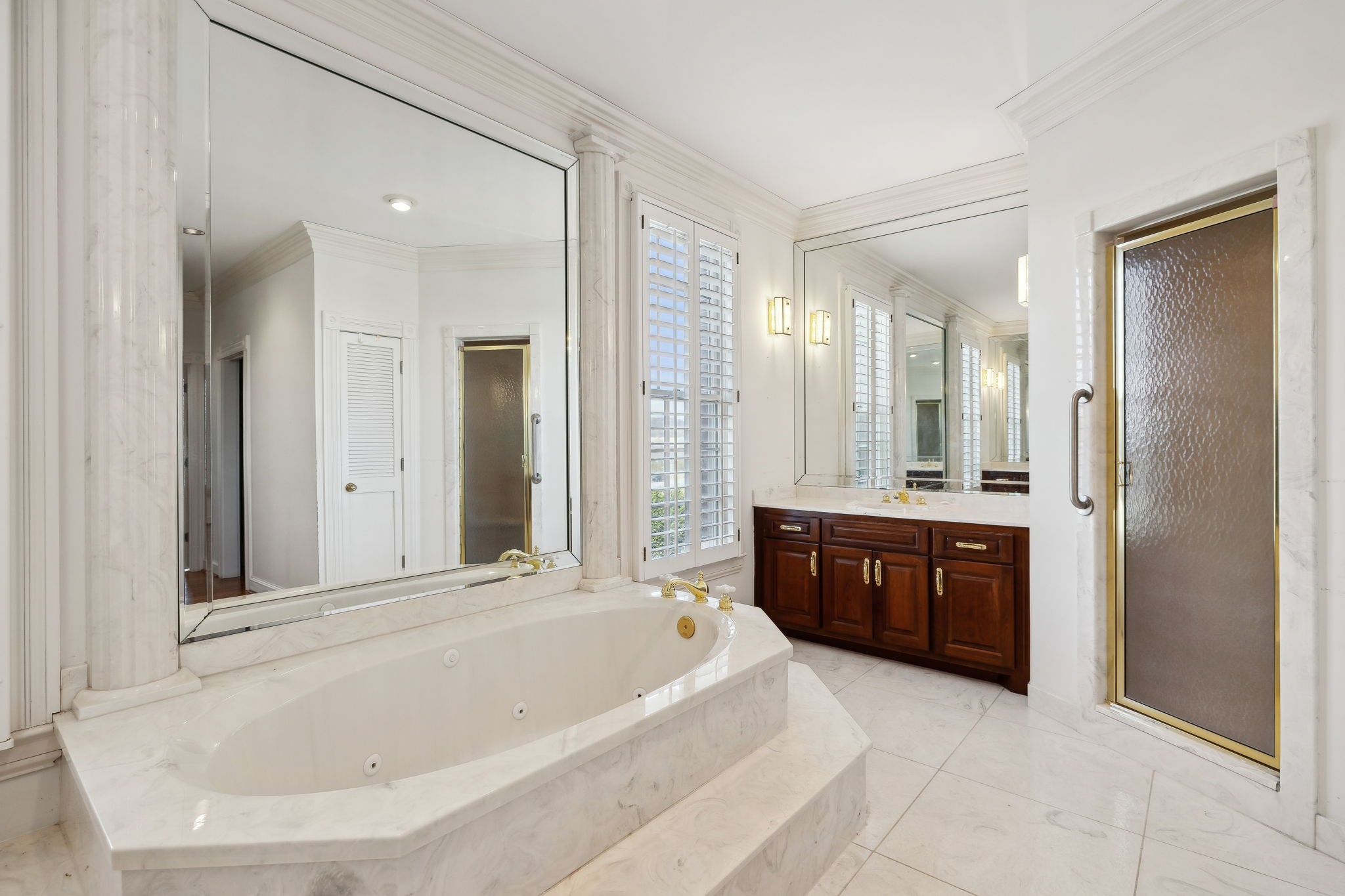 5090 Main Street Spring Hill, TN 37174 - Photo 34 of 91 a large spacious bathroom with a tub sink shower and mirror