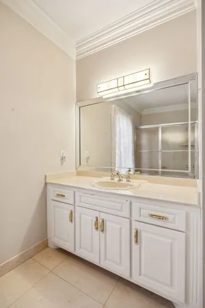 a picture of a bench in a bathroom