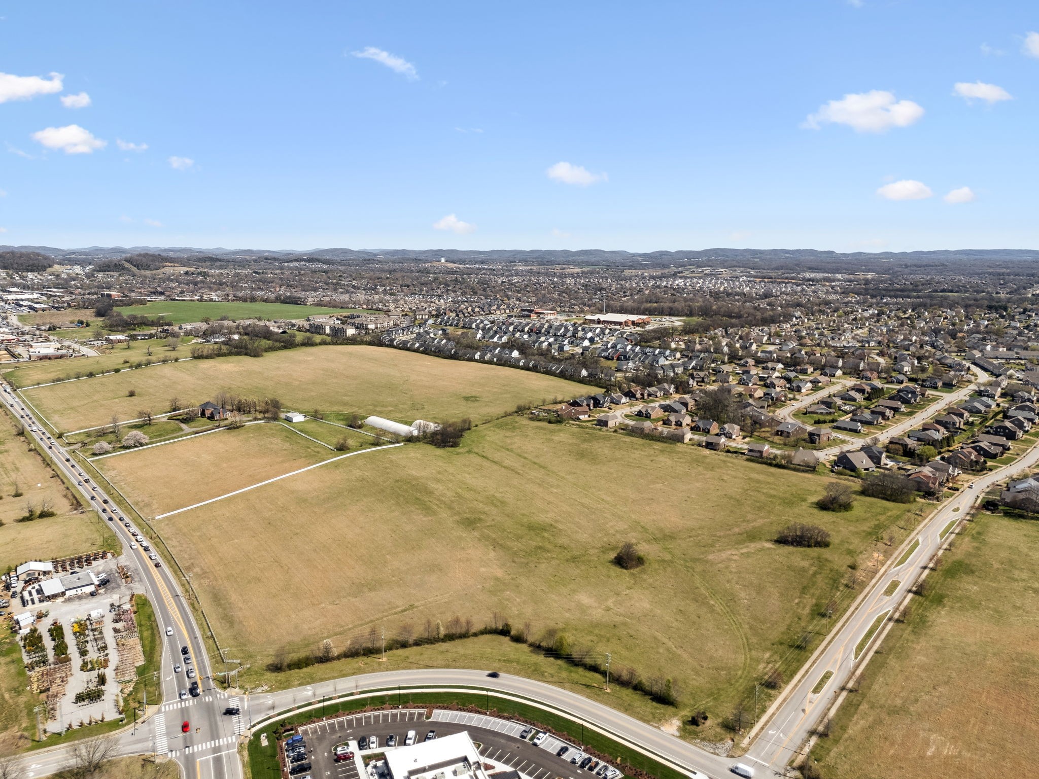 5090 Main Street Spring Hill, TN 37174 - Photo 79 of 91 an aerial view of residential houses with outdoor space