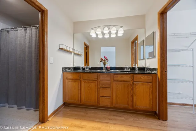 a white toilet sitting next to a shower curtain