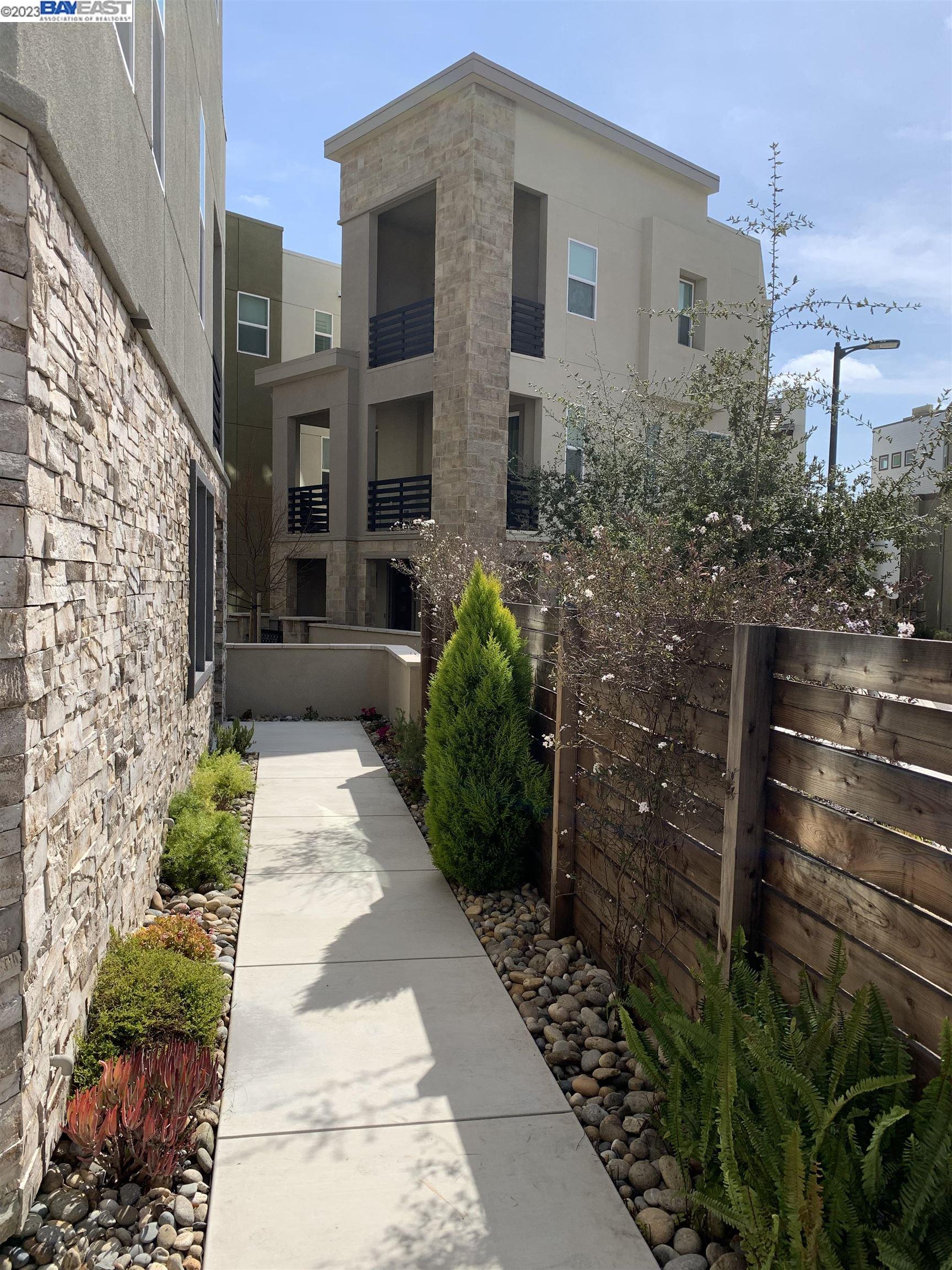 5772 Barley Road Dublin, CA 94568 - Photo 37 of 56 a pathway of a house with a yard