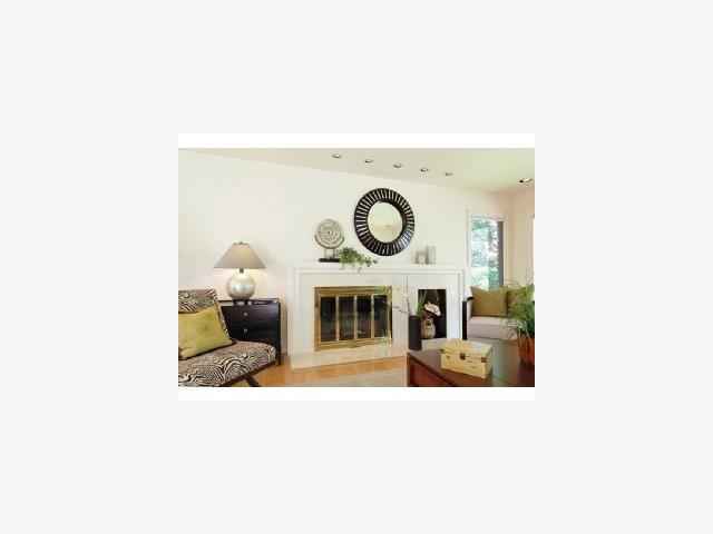 185 Phillip Road Woodside, CA 94062 - Photo 2 of 9 a living room with furniture and a fireplace