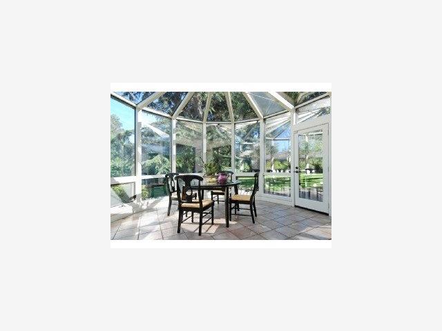 185 Phillip Road Woodside, CA 94062 - Photo 7 of 9 a dining area with glass top table and chairs