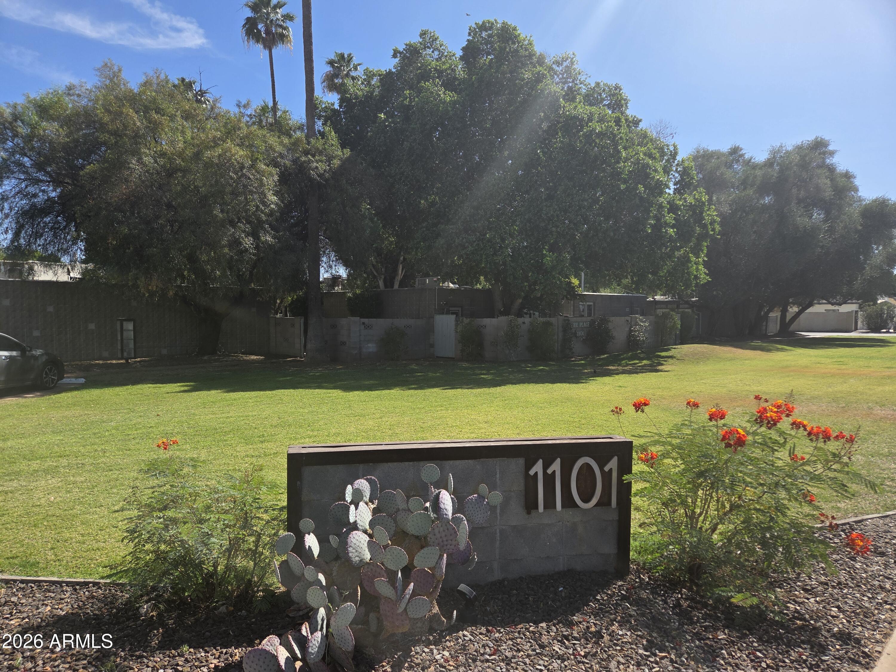 1101 East Bethany Home Road, Unit 7 Phoenix, AZ 85014 - Photo 1 of 14 a view of swimming pool with a yard