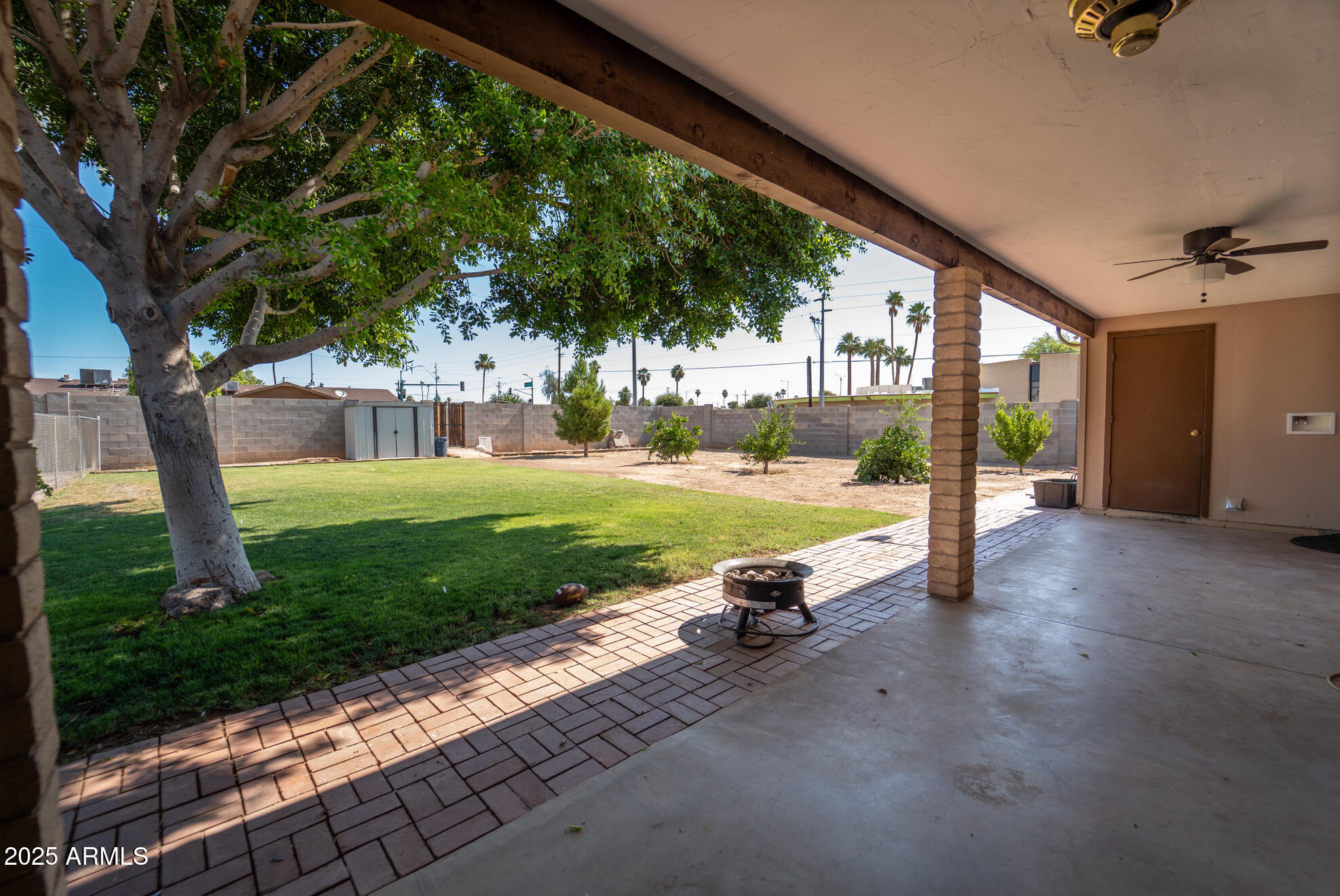 3102 West Paradise Drive Phoenix, AZ 85029 - Photo 18 of 22 a view of a swimming pool with a yard