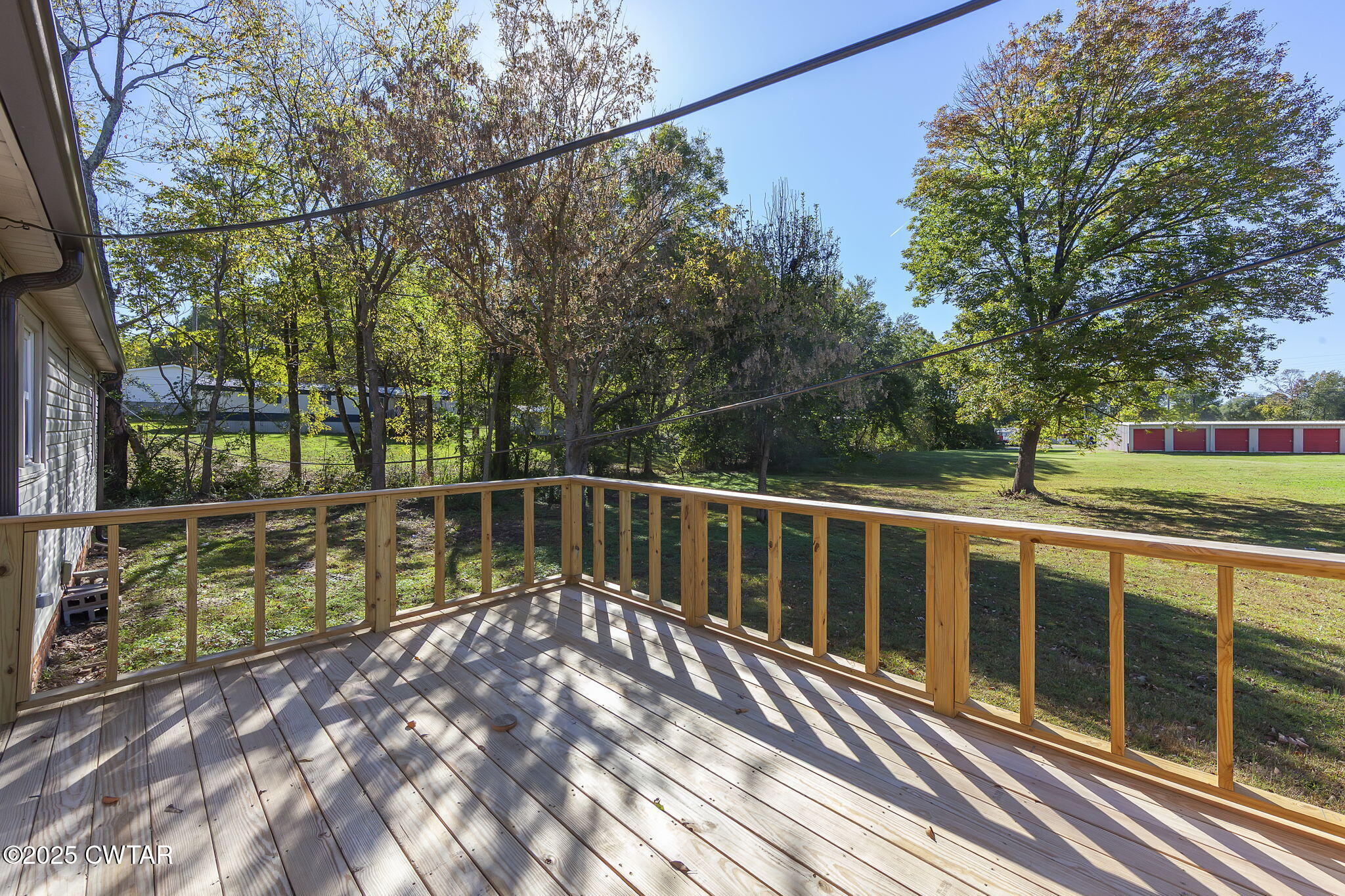 424 Rozelle Street Gibson, TN 38343 - Photo 17 of 20 a view of a balcony with wooden floor