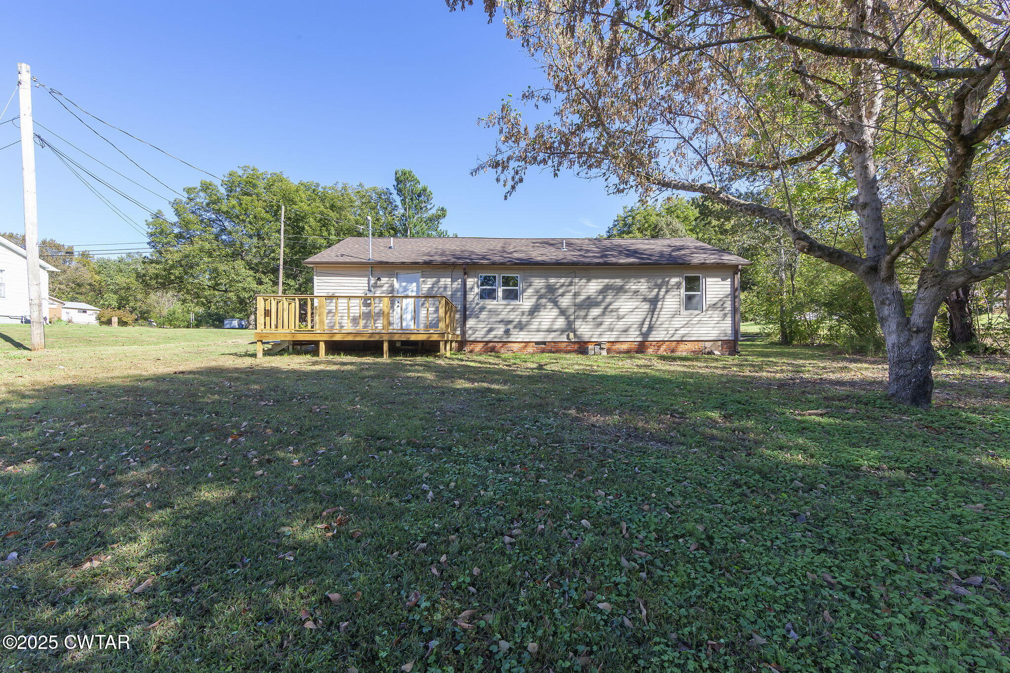 424 Rozelle Street Gibson, TN 38343 - Photo 18 of 20 a view of a house with a yard