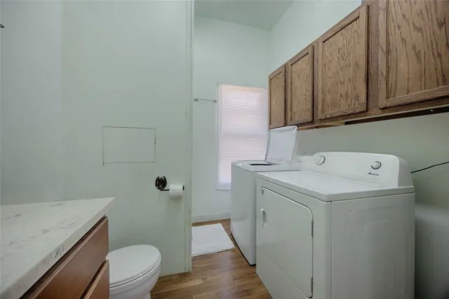 a utility room with dryer and washer