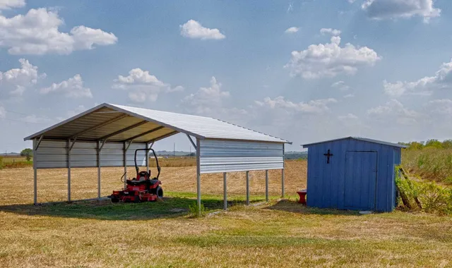a view of a backyard of a house
