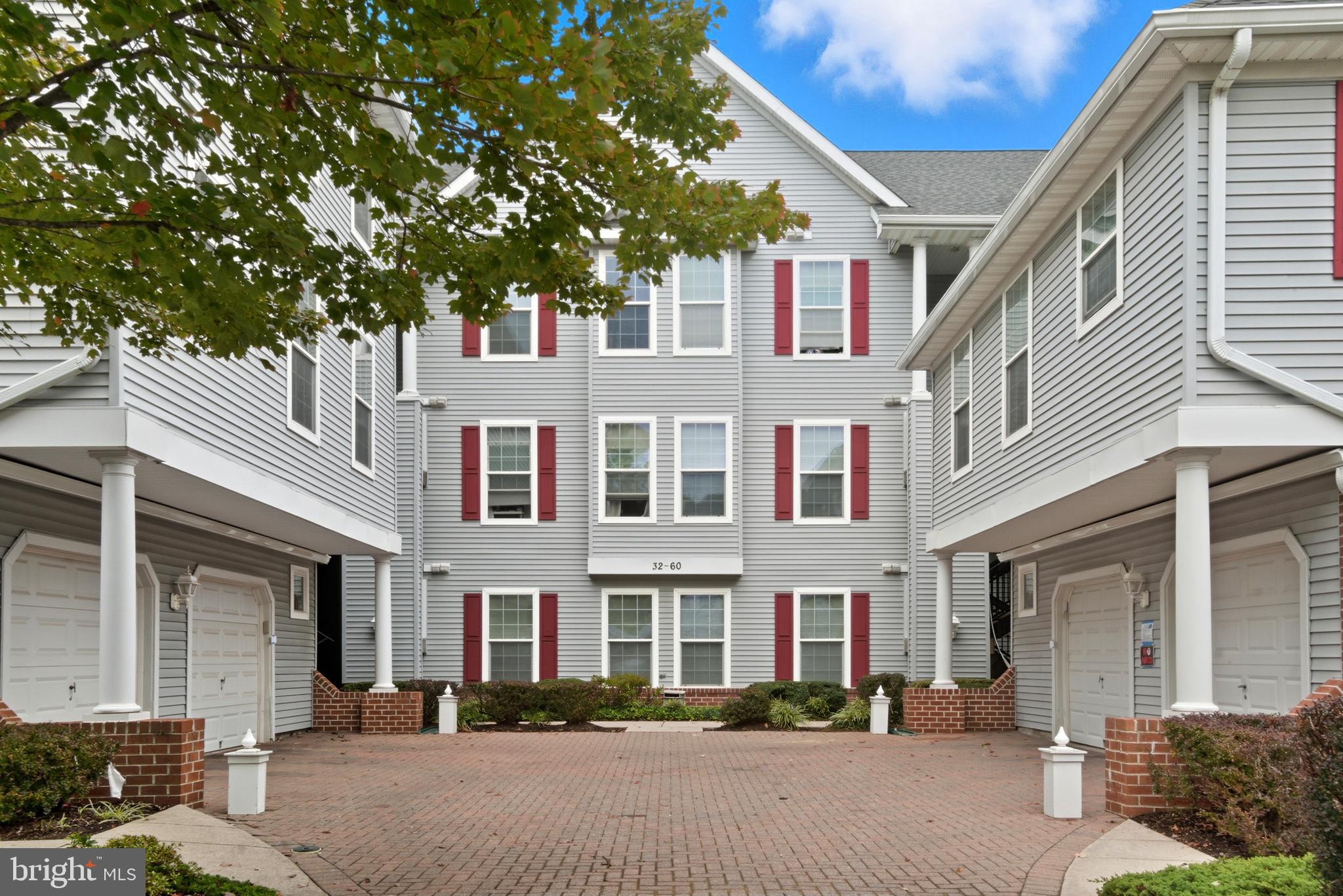 34 Hawk Rise Lane, Unit 103 Owings Mills, MD 21117 - Photo 28 of 29 a front view of a building