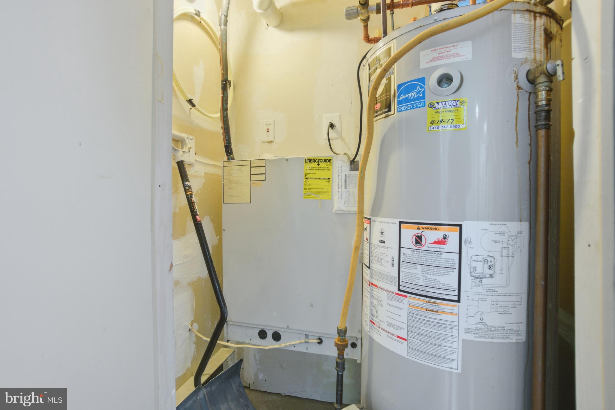 34 Hawk Rise Lane, Unit 103 Owings Mills, MD 21117 - Photo 10 of 29 a utility room with dryer and washer