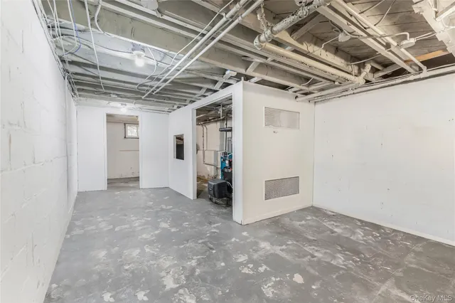 a view of a room with wooden walls