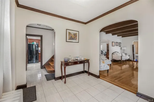 a bedroom with furniture and natural light