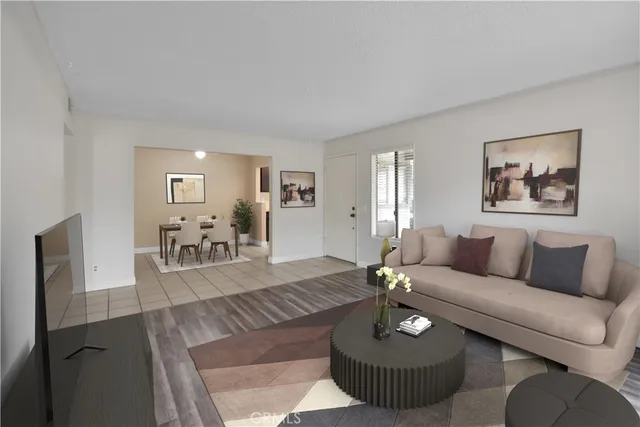 a living room with furniture and a table