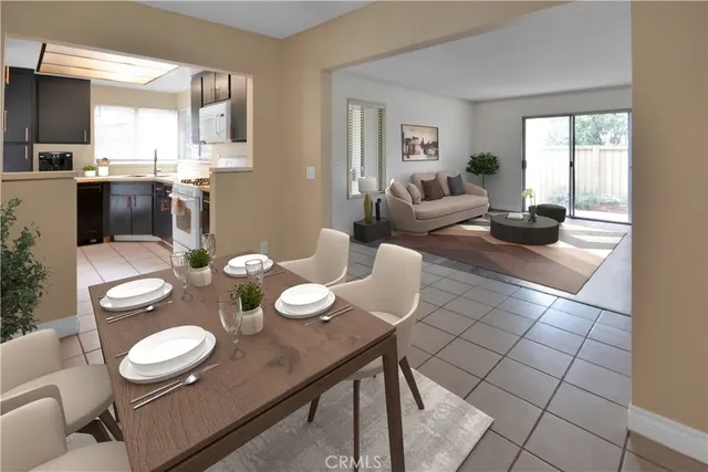 a view of a dining room with furniture and a table