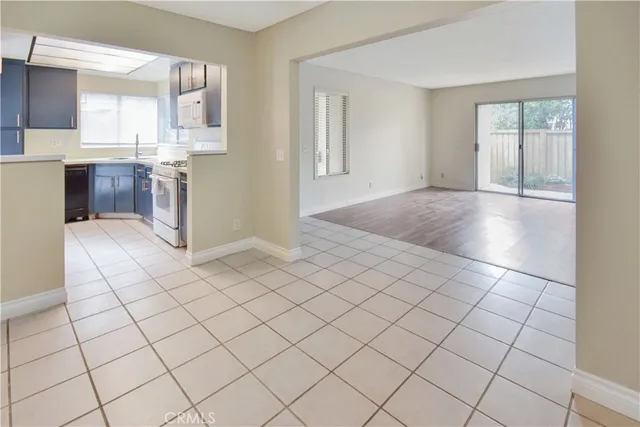 a view of a kitchen and window