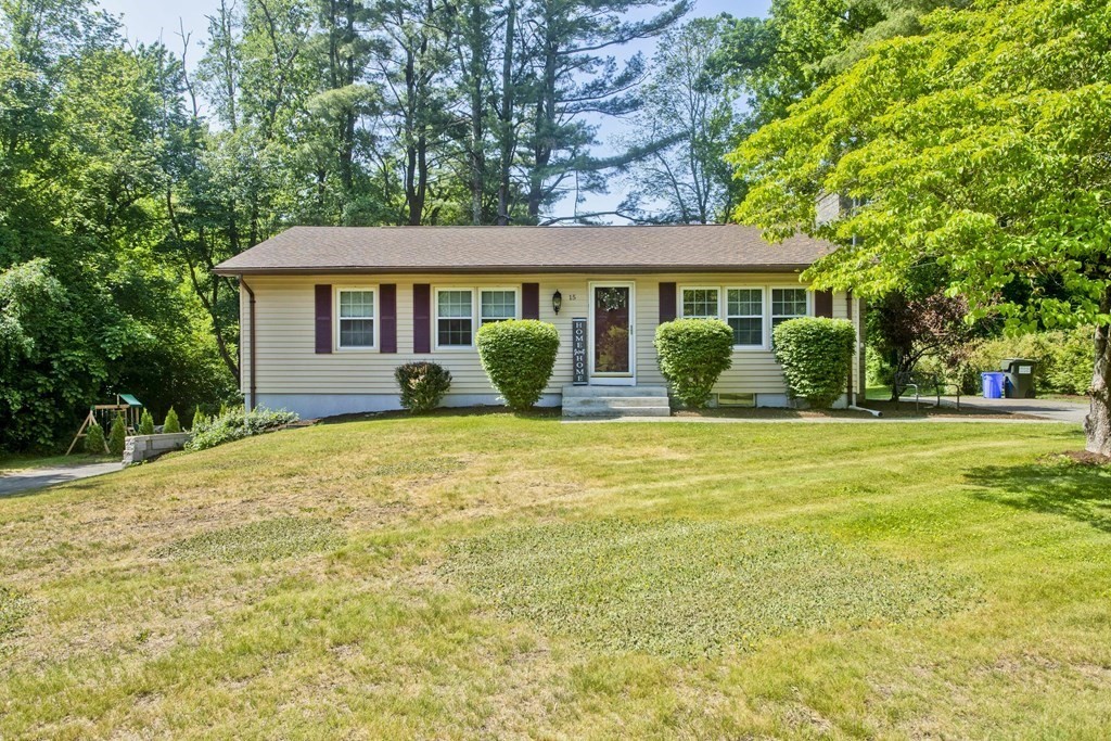 15 Circle Drive Wilbraham, MA 01095 - Photo 1 of 42 a front view of a house with yard and green space