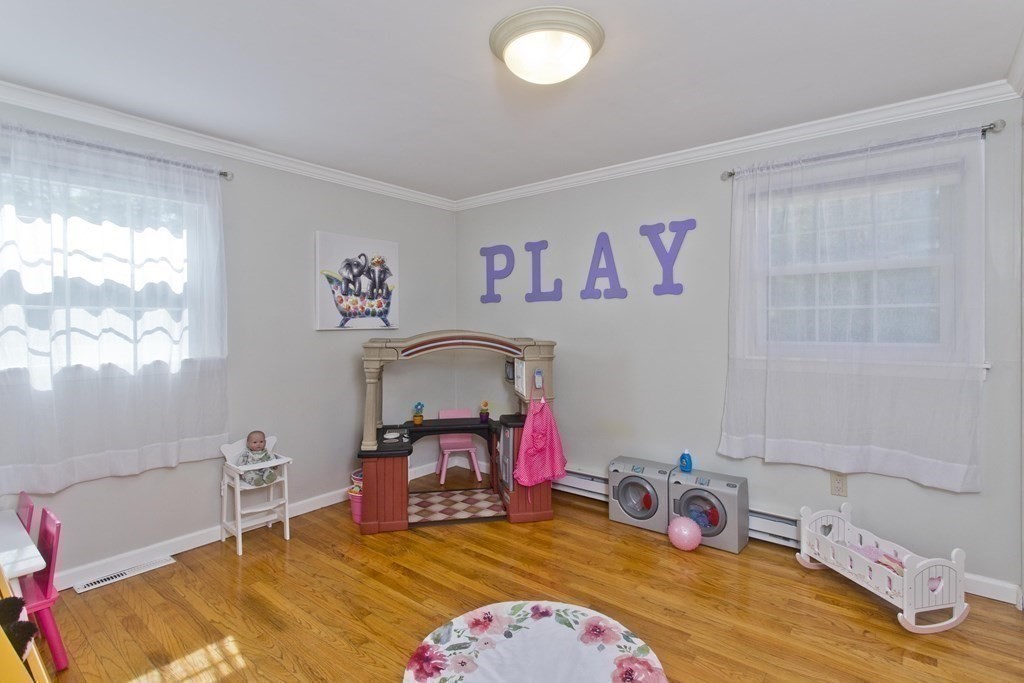 15 Circle Drive Wilbraham, MA 01095 - Photo 15 of 42 a bedroom with a bed a couch and a window