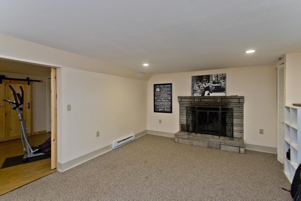 15 Circle Drive Wilbraham, MA 01095 - Photo 18 of 42 a view of an empty room with a fireplace