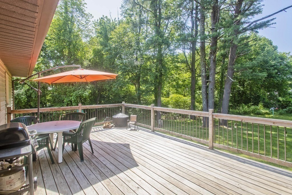 15 Circle Drive Wilbraham, MA 01095 - Photo 20 of 42 a balcony with wooden floor and outdoor seating