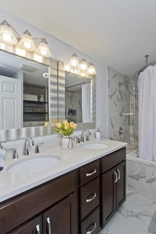 15 Circle Drive Wilbraham, MA 01095 - Photo 32 of 42 a bathroom with a sink double vanity and a mirror