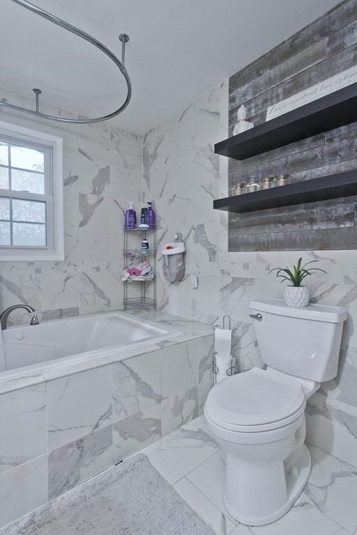 15 Circle Drive Wilbraham, MA 01095 - Photo 33 of 42 a bathroom with a toilet a sink and a bathtub