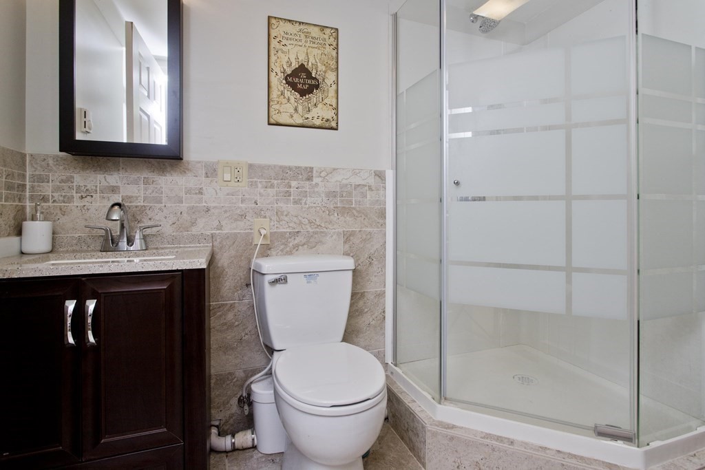 15 Circle Drive Wilbraham, MA 01095 - Photo 37 of 42 a bathroom with a toilet sink and shower