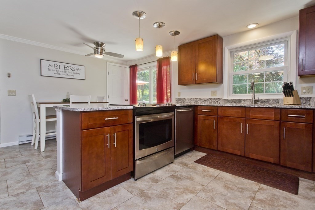 15 Circle Drive Wilbraham, MA 01095 - Photo 6 of 42 a kitchen with a sink stove and microwave