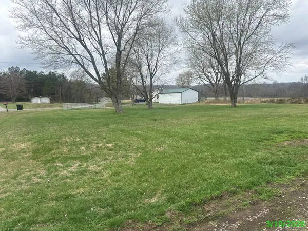 a view of outdoor space and yard