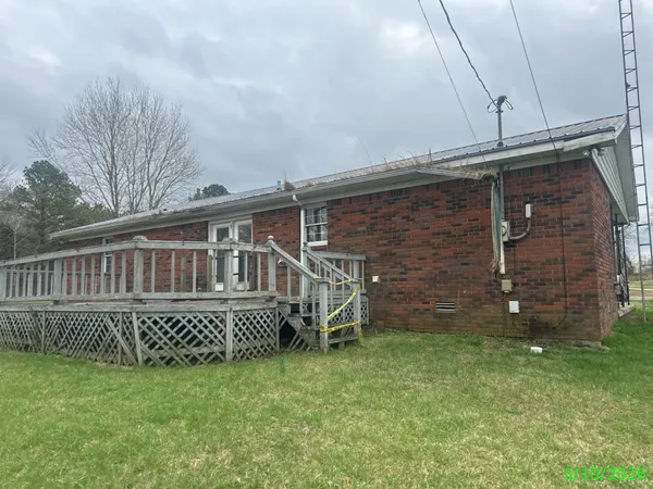 a backyard of a house with a garden