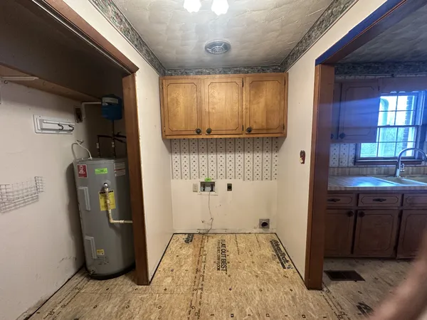 a view of a refrigerator and window
