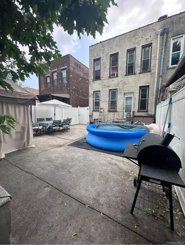 a car parked in front of a brick building